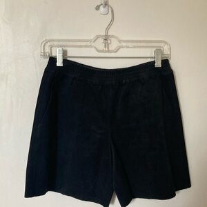 Babaton black suede shorts